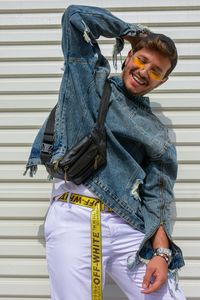 Portrait of young man standing outdoors