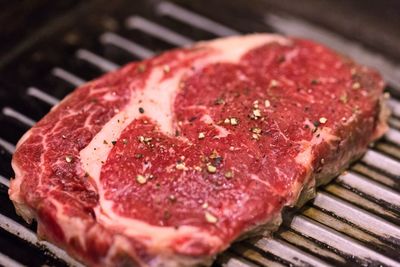 Close-up of meat on barbecue grill