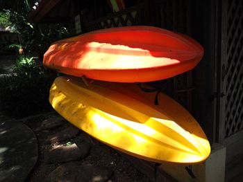 Close-up of lantern hanging on wall