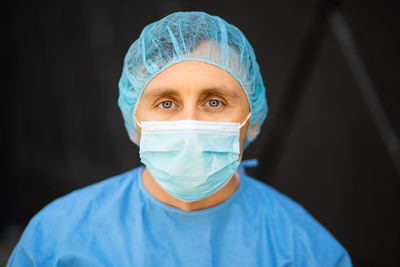 Portrait of man wearing protective mask