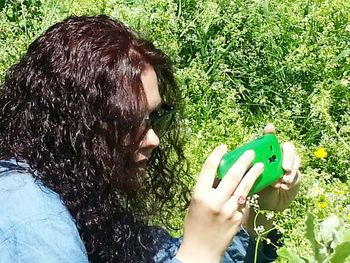 Young woman in grass