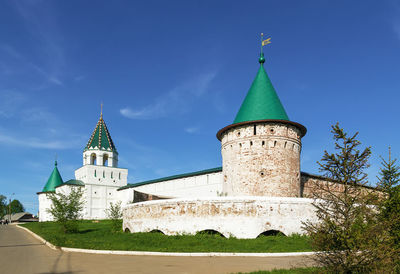 Low angle view of building against blue sky