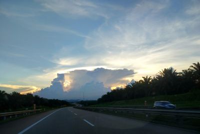 Road against sky during sunset