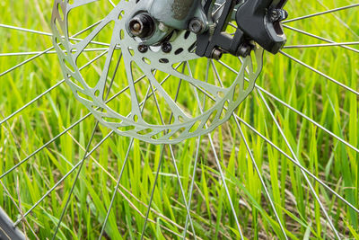 High angle view of bicycle wheel on field