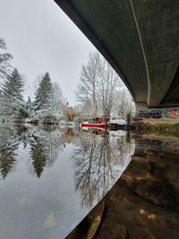 Bridge over lake against sky