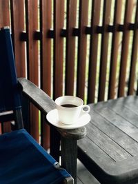 High angle view of tea on chair