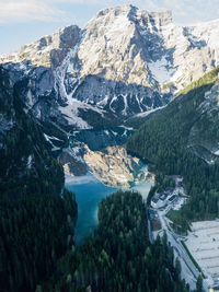 Aerial view of snowcapped mountains during winter