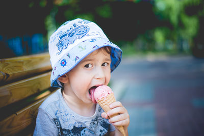 Portrait of cute boy eating ice cream