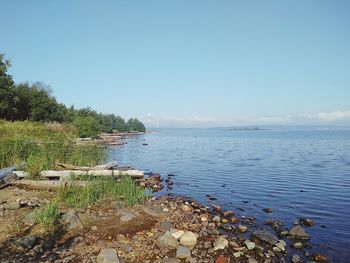 Scenic view of sea against clear sky