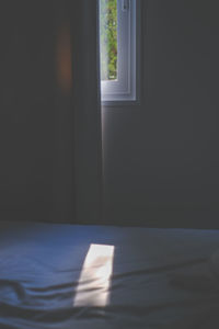 Sunlight falling on wall at home