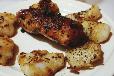 High angle view of roasted meat in plate