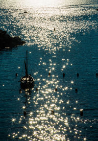 High angle view of sailboat in sea