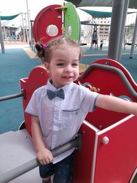 Portrait of cute girl in amusement park