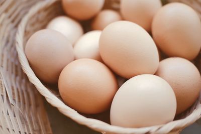 High angle view of eggs in basket