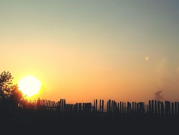 Scenic view of sunset over city