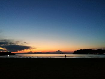 Scenic view of beach during sunset