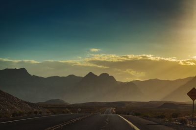 Scenic view of mountains against sky during sunset