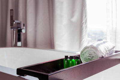 Close-up of beer glass on table at home