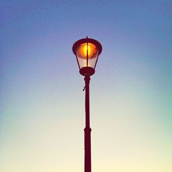 Low angle view of illuminated street light