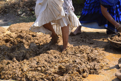 Low section of women on rock