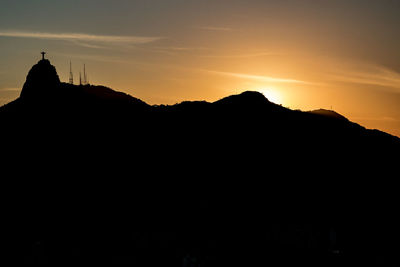 Scenic view of mountains at sunset