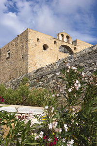 Low angle view of historical building against sky