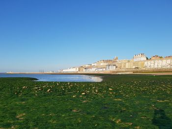 Scenic view of sea against clear sky