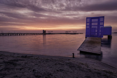 Scenic view of sea against sky at sunset