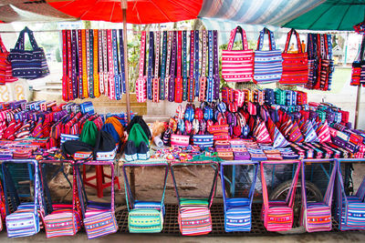 Multi colored flags for sale in store