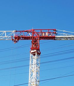 Low angle view of tower against clear blue sky