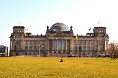 Tourists in front of historical building