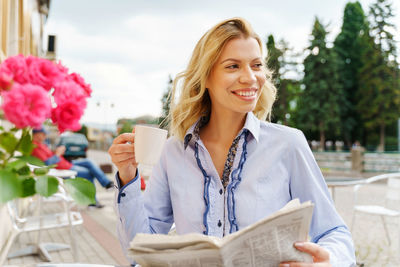 Portrait of a smiling young woman