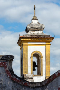 Low angle view of temple against building