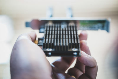 Close-up of man using mobile phone