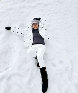 Low section of person skiing on snow