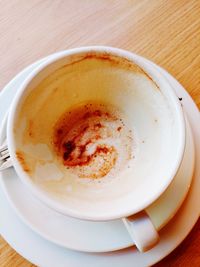 High angle view of cappuccino on table