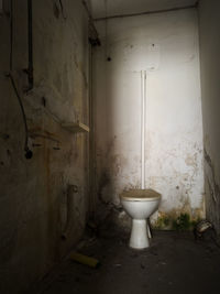 Interior of abandoned bathroom