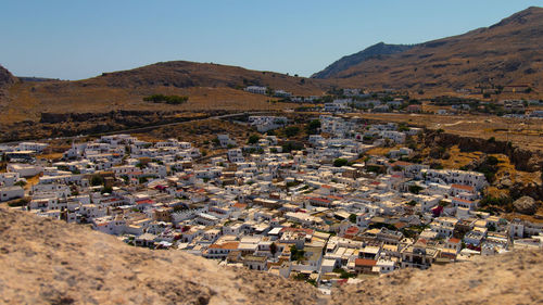 Aerial view of townscape against sky