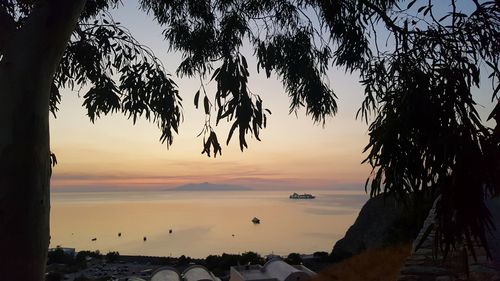 Scenic view of sea against sky at sunset