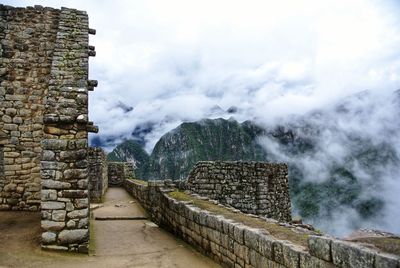 View of historic building against cloudy sky