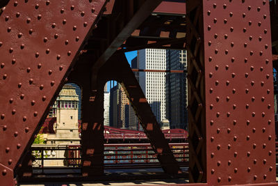 Bridge against buildings in city