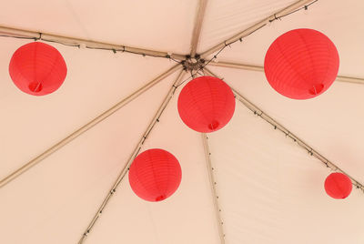 Low angle view of lanterns hanging at ceiling