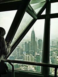 Skyscrapers seen through glass window