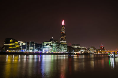 Illuminated city lit up at night