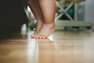 Low section of child at home