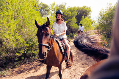 Horse riding horses