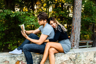 Young couple sitting in a park