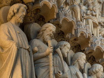 Low angle view of statues at temple