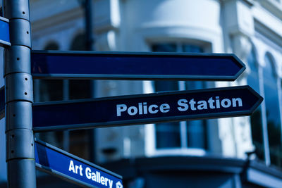 Low angle view of information sign on road