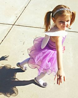 Full length portrait of girl on walkway